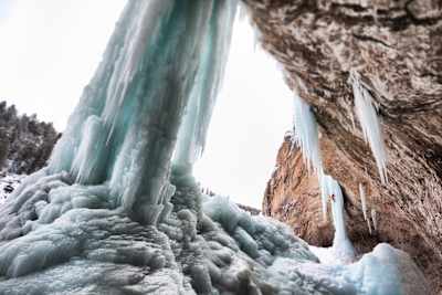 Sam Elias climbs a frozen waterfall in Rifle, Colorado, USA.