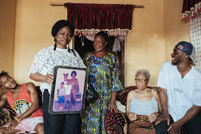 Courage Adams as seen with his mum and grandmother during the filming of Encouraged in Benin City, Nigeria, on April 30, 2019.