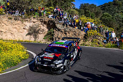 Championship leader Evans ended 9.6sec behind Ogier