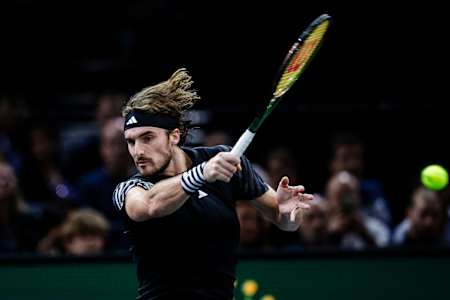 Stefanos Tsitsipas of Greece plays a forehand against Grigor Dimitrov of Bulgaria during Rolex Paris Masters on November 4, 2023 in Paris, France.  