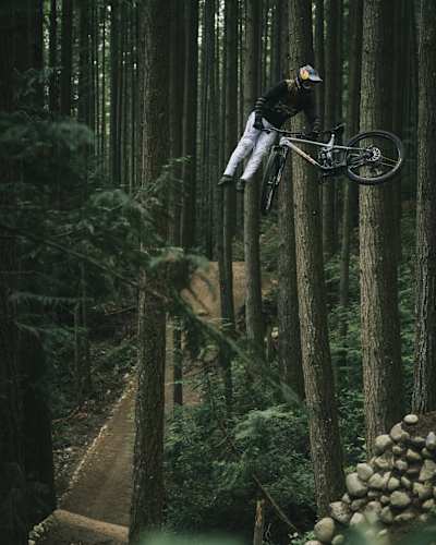 MTB athlete Brandon Semenuk shows off his skills in the forests of Sechelt (Canada).