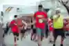 Participants running and smiling at Red Bull World Wings for Life 2021 event in Barcelona, Spain May 9, 2021  