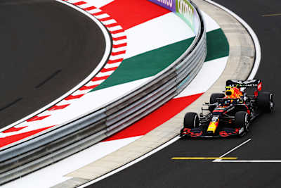 Max Verstappen driving his Red Bull single-seater on the Hungaroring circuit during the Hungarian Formula 1 Grand Prix.