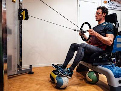 Thierry Neuville uses a steering wheel as part of his gym-based resistance training.