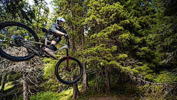 Martin Söderström does a whip in a forest in Sweden.