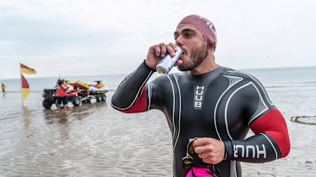 Ross Edgley drinks a can of Red Bull prior to the start of his Great British Swim attempt, June 1, 2018.