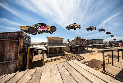 Bryce Menzies jumps a ghost town in his Pro2 truck.