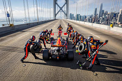 Photo of the Aston-Martin Red Bull Racing F1 team at work on the San Francisco Bay Bridge.