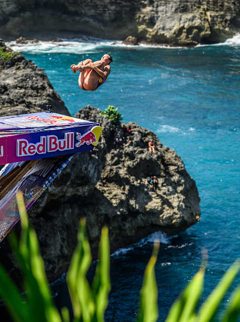 Rhiannan Iffland of Australia launches from the 22-metre platform at Broken Beach during the 2026 Red Bull Cliff Diving World Series in Bali, Indonesia, on 23 May 2026