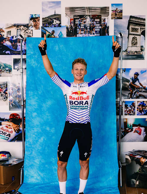 Sebastian Putz of Team Red Bull   BORA   hansgrohe raises his arms in celebration during a photo shoot on 21 October 2025 in Fuschl am See, Austria