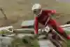 A photograph of world champion mountain biker Rachel Atherton in action.