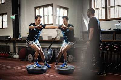 British ultrarunner Tom Evans trains in the gym.