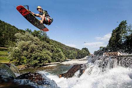 Dominik Hernler hits a wild water gap at Winchelroute in Spittal, Austria on July 1st, 2015 