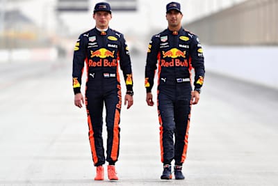 Red Bull team-mates Daniel Ricciardo (right) and Max Verstappen (left) go for a trackside stroll.