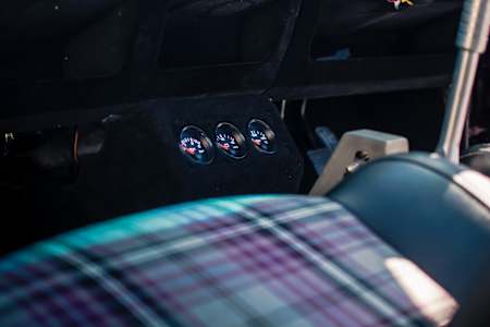 Tartan seats to match the retro theme throughout the car