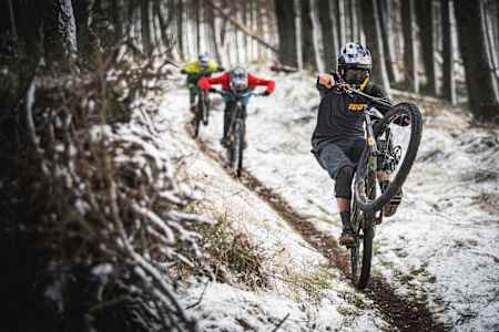 Matt Jones, Jono Jones and Kriss Kyle manual on a MTB trail in Scotland.