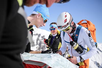 Bernhard Hug studying maps at Red Bull Der Lange Weg between Airolo to Rifugio Arona, Switzerland on April 7, 2018.