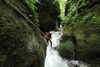 A Canyoner gets down to a Canyon in Dollar Falls in Scotland.