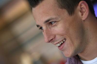 A portrait of Christian Klien enjoying his time in the paddock at the 2014 Austrian Grand Prix.