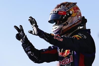 A photo of Sebastian Vettel celebrates winning the 2013 FIA Formula One World Championship at the Circuit of The Americas in Austin, United States.