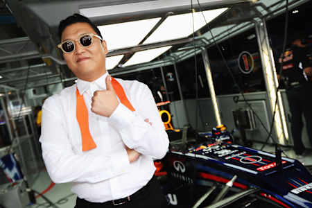 Korean pop star PSY visits the Red Bull Racing garage before the Korean Formula One Grand Prix at the Korea International Circuit in Yeongam, South Korea.
