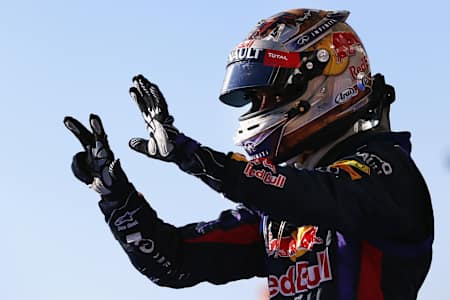 A photo of Sebastian Vettel celebrates winning the 2013 FIA Formula One World Championship at the Circuit of The Americas in Austin, United States.