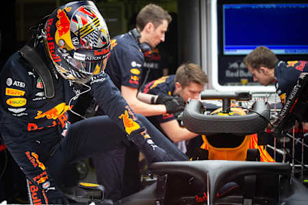 A photo of Red Bull Racing's Dan Ticktum preparing to drive in the garage during day two of Formula 1 testing at Circuit de Barcelona-Catalunya on May 15, 2019 in Barcelona, Spain.