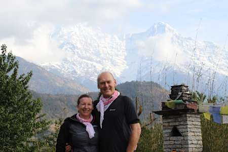 Julia Sage-Bell and fiancée pose together in the mountain village of Ghandruk