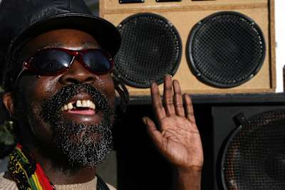 Soaking up the sounds from a soundsystem at Notting Hill Carnival 2006.