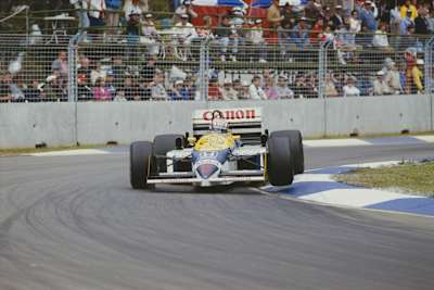 A photo of Nigel Mansell taking a corner at the Adelaide Street Circuit during the 1986 Australian Grand Prix.