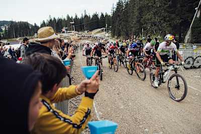 Competitors participate at the XCC race at the Lenzerheide round of the UCI World Cup in September 2021.