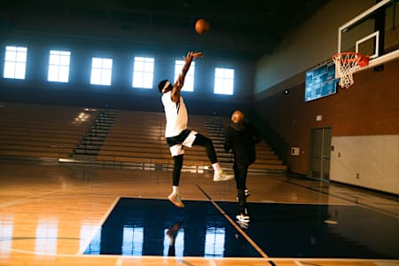 Pascal Siakam on court with Rico Hines