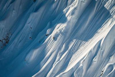 Sven Kueenle freeriding down majestic spines in Alaska.