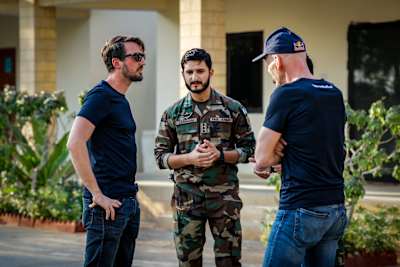 Florian and Paul in talks with pilots at Faisal Base