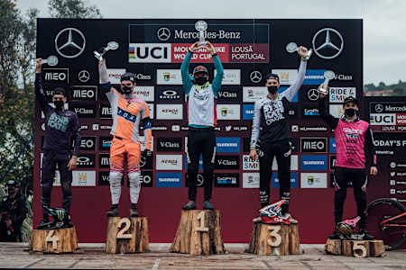 Competitors stand on the podium at UCI DH World Cup in Lousa, Portugal on November 1st, 2020