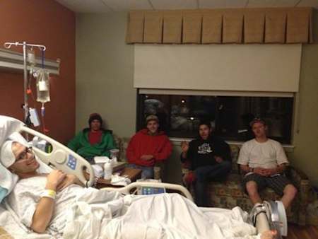 Me in hospital after the accident being visited by my buddies.