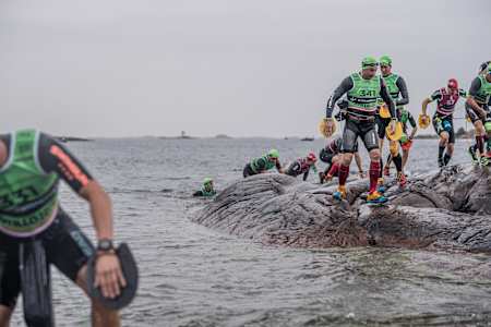 Participants take part in the Otillo swim run world champs in Sweden.