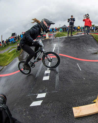 Christa Von Niederhausern crosses the finish line to take first place at the Red Bull Pump Track World Championships in Springdale, Arkansas, on October 13, 2018.