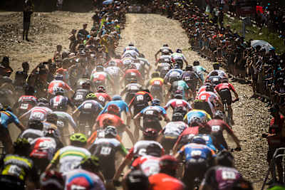 Participants perform at the UCI Mountain Bike World Cup in Vallnord, Andorra on July 7, 2019.