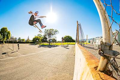 Ryan Sheckler frontside flips a step up in Los Angeles, California.