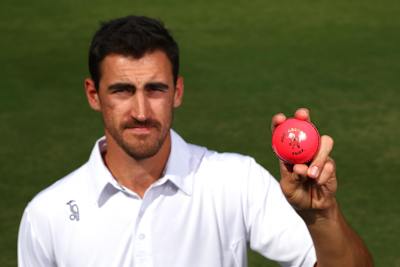Australian fast bowler Mitchell Starc with the pink Kookaburra cricket ball.