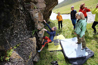 People learning to boulder outdoors with Angy Eiter.