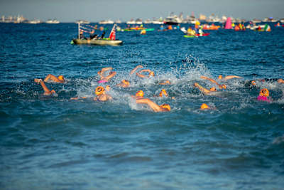 Swimmers take part in the Port to pub race in Australia.