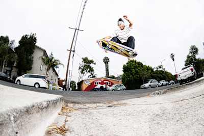 Mariah Duran blasts an ollie over a street gap during filming of Skate And Create 2020