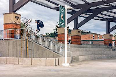 Ryan Sheckler Ollie over a rail in Riverside, California