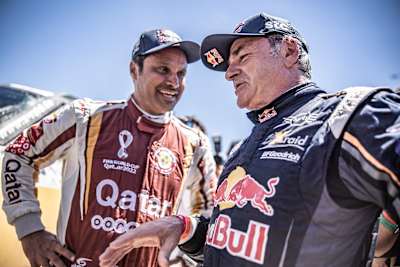 Nasser Al-Attiyah and Carlos Sainz seen at the finish line of Rally Andalucia in Villamartin, Spain on May 17, 2021 