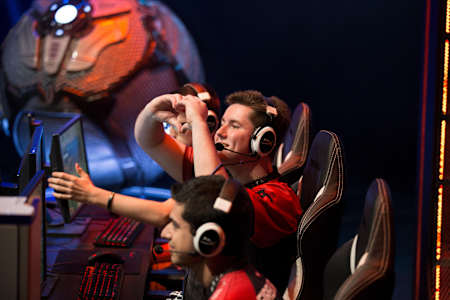 Jacob makes a heart with his hands as NRG plays.