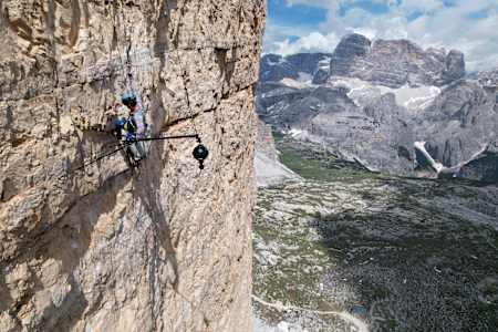 A 360-degree camer mounted on a cliff face for The Soloist VR film.