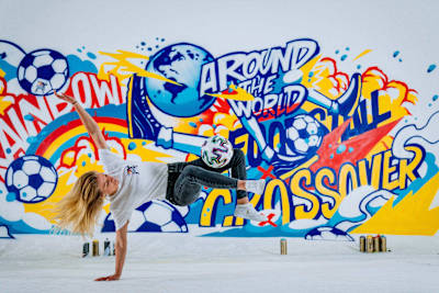Freestyle footballer Aguska Mnich performs in front of a mural to celebrate the launch of Red Bull Street Style World Championship 2021, in London, England on May 14, 2021.