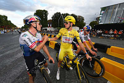 A gracious congratulator: Remco congratulates Pogacar on his victory